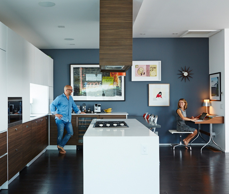 modern townhouse in Toronto - third-storey kitchen shares space with the living room.