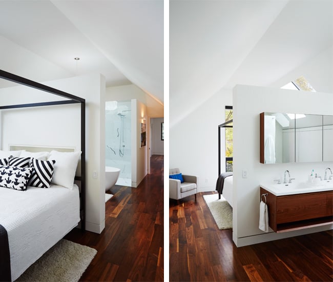 Bedroom and bathroom divided by a partial wall room divider