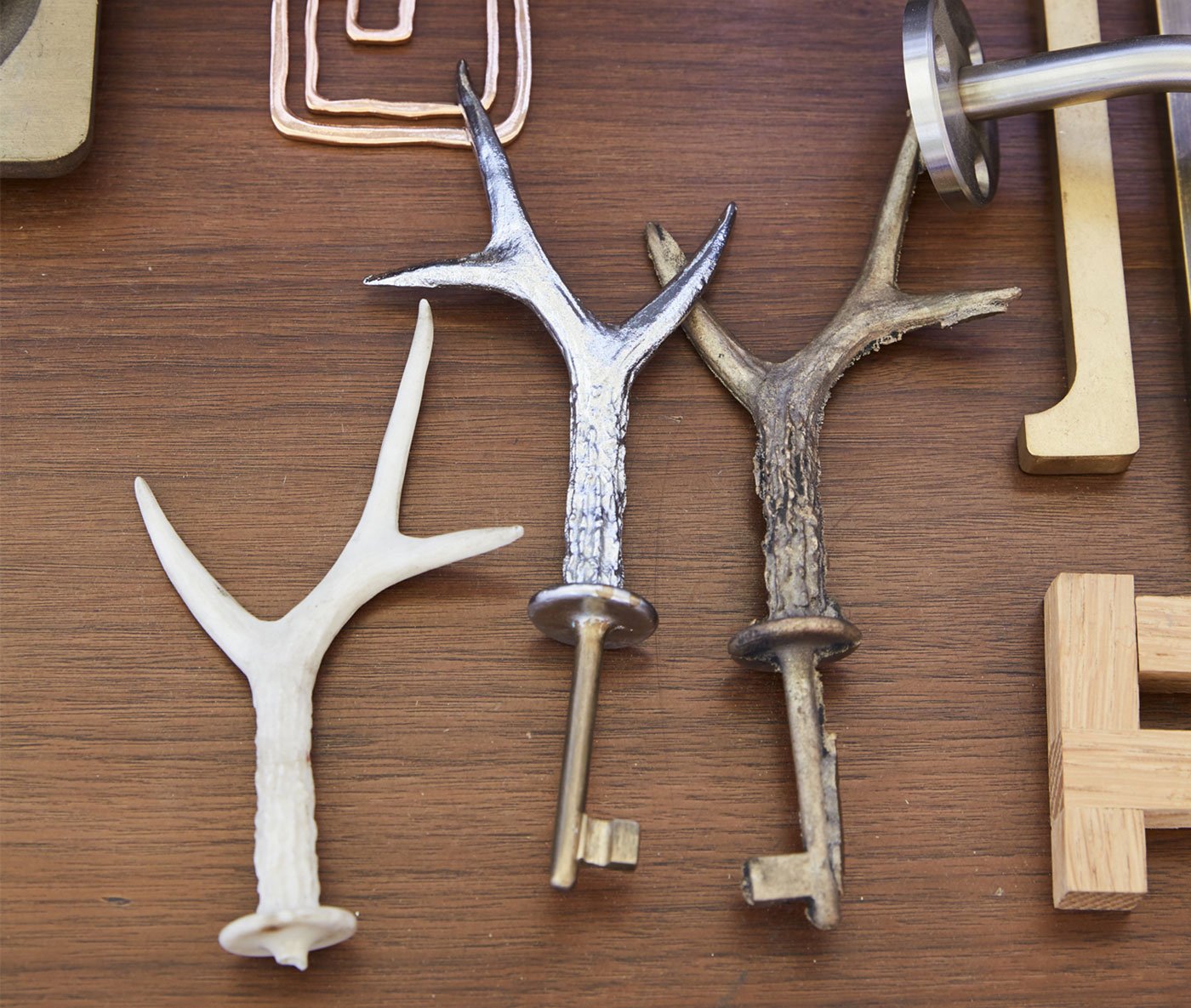 Filo Timo - Cast bronze keys sit among custom hinges and handles.