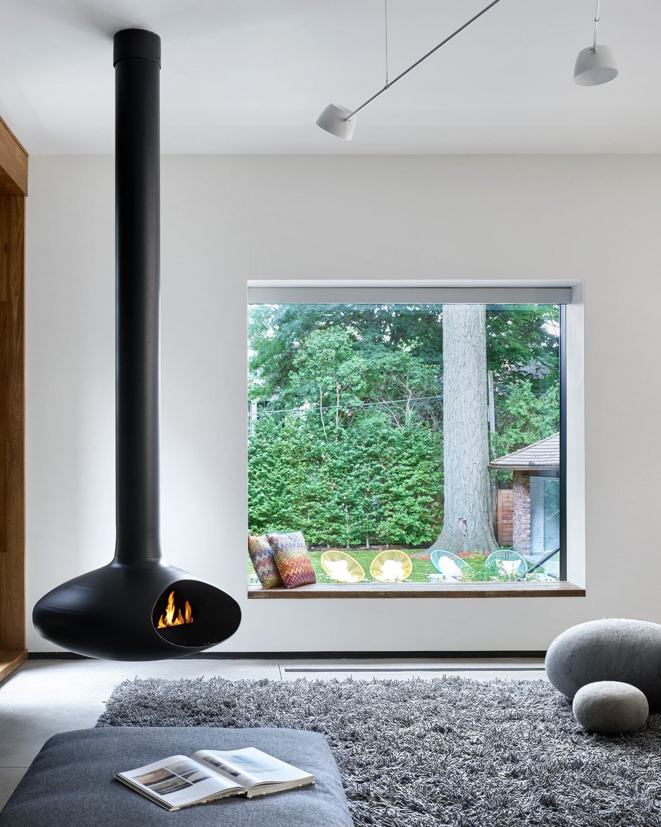 Living room with Fireplace by Fireorb, design by Audax Architecture
