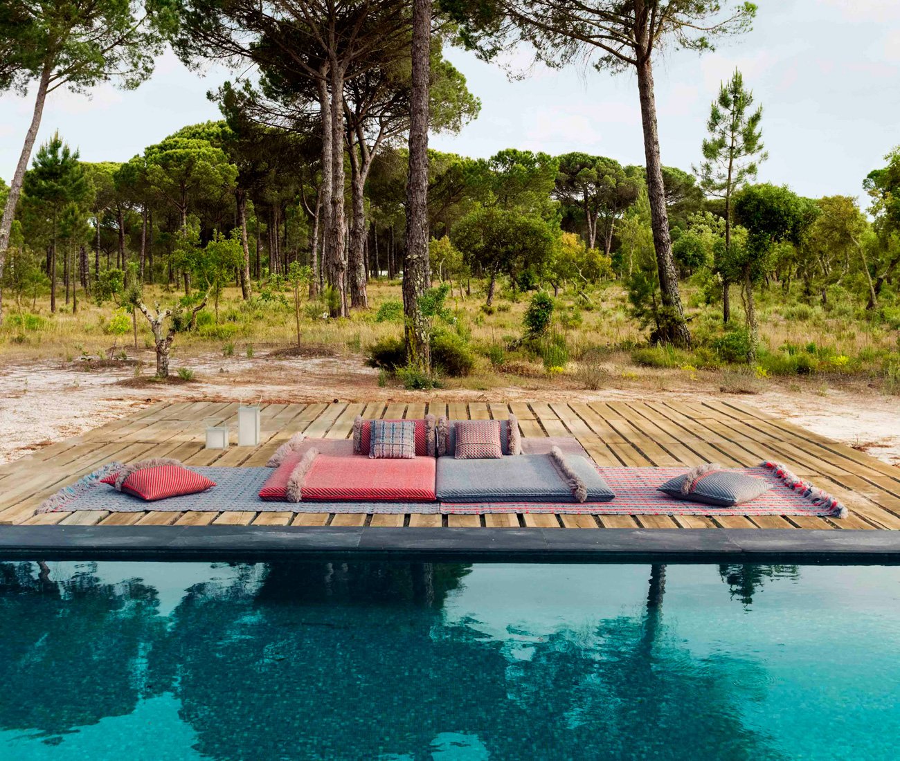 Patricia Urquiola referenced India’s quintessential carpets and roll cushions for her latest rug collection