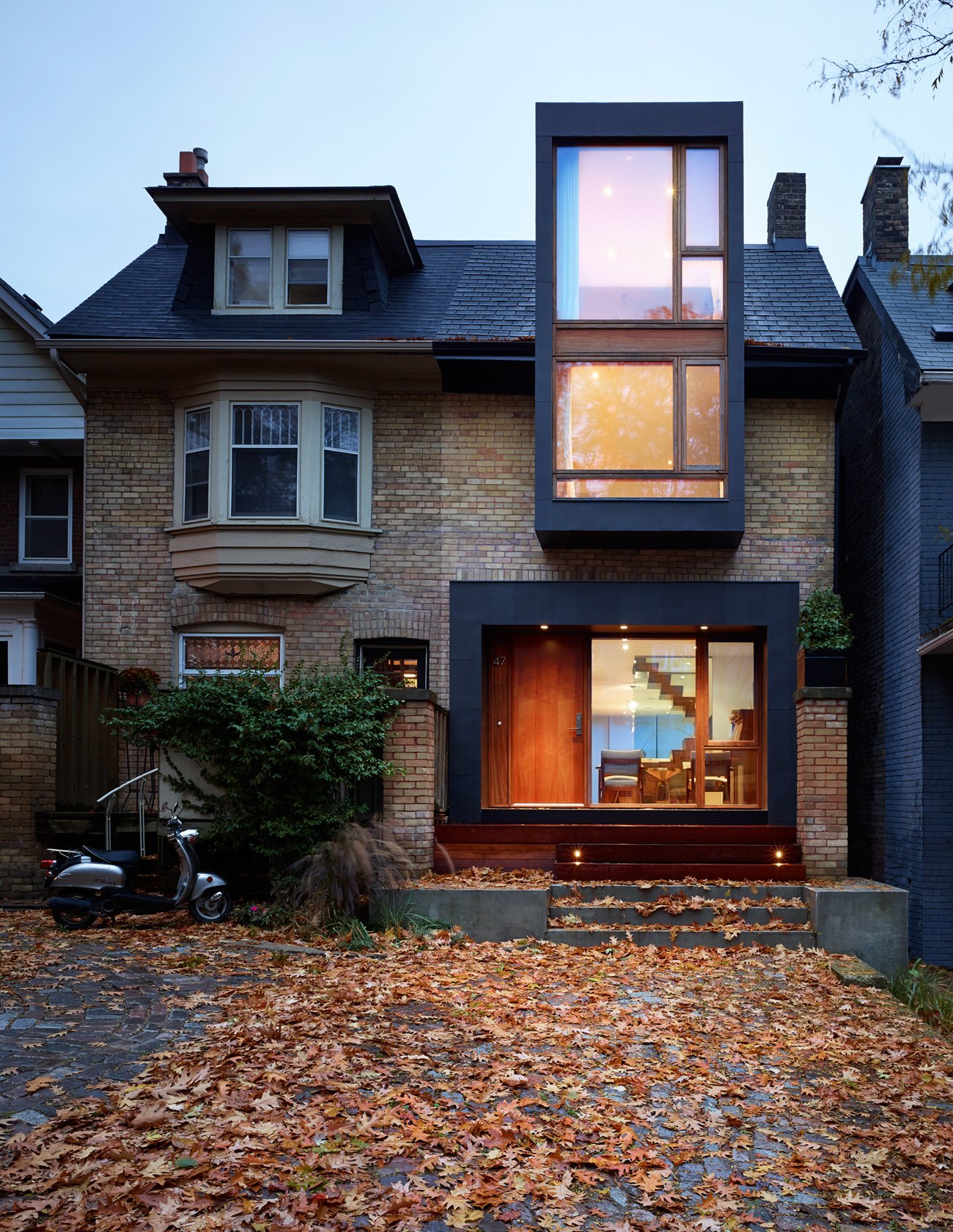 Double-Height Extension in Modern Toronto Beaches Home by Drew Mandel Architects