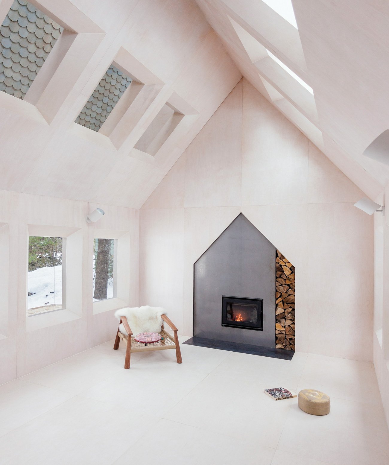 Modern cottage with a pitched roofline by UUfie Architects