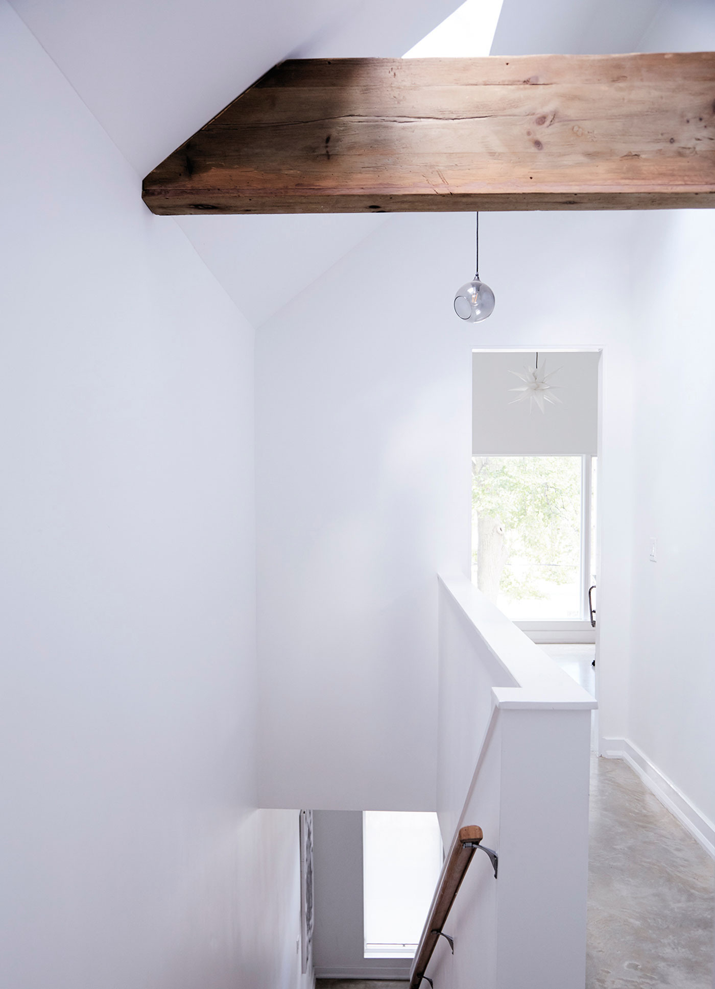 The second-storey also features an office and a bathroom devised as a wet room – with sloped concrete flooring