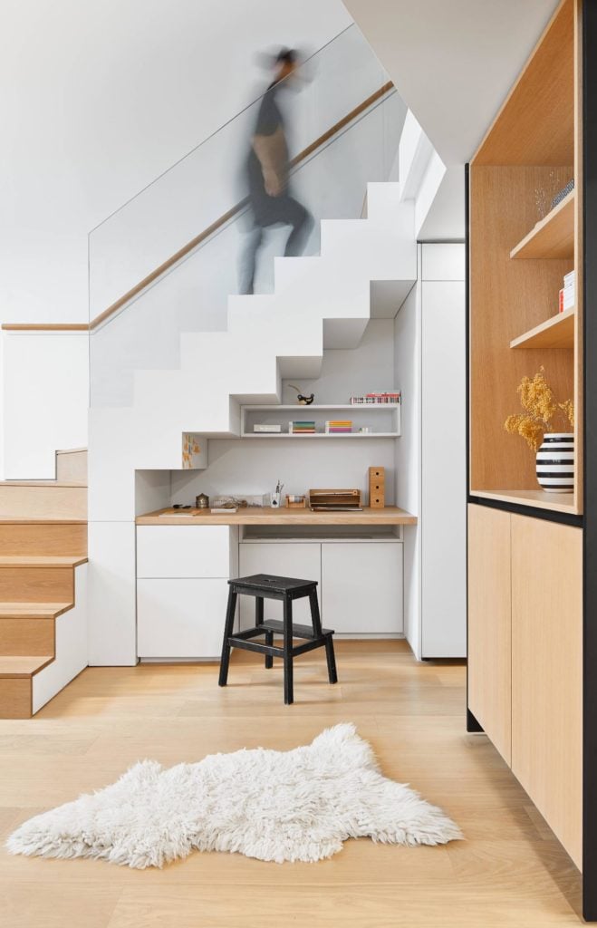 Person walking up the stairs in a condo