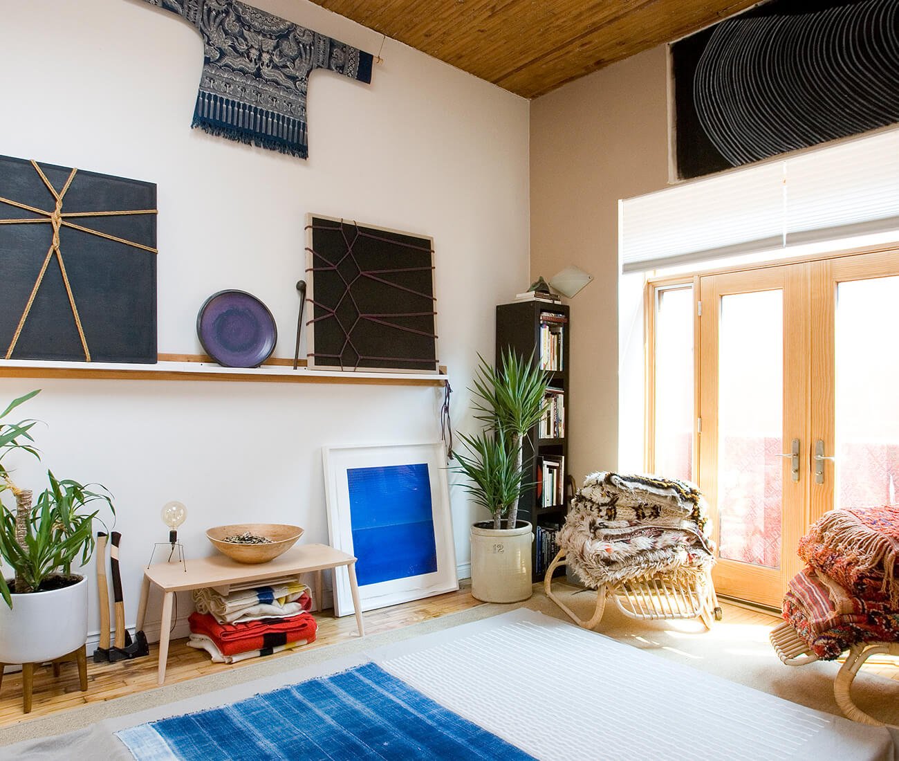 Alex Jowett's studio with Malian textile artwork and Moroccan rugs