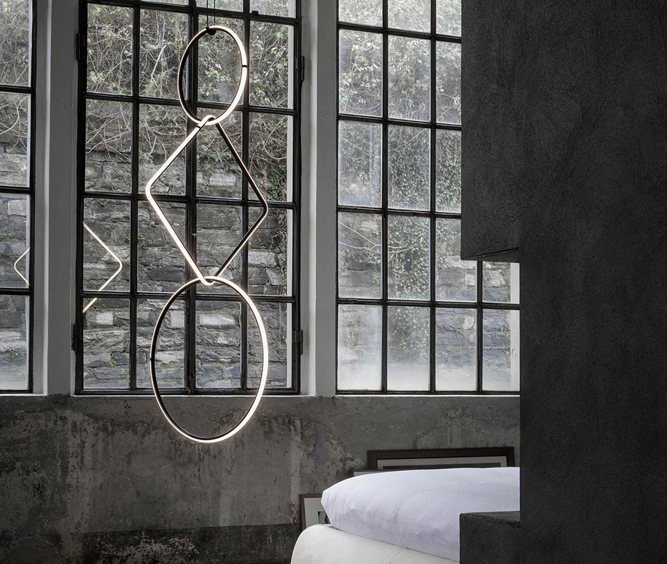Geometric chandelier in a bedroom