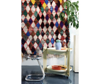 Seating with small side table and textile wall art