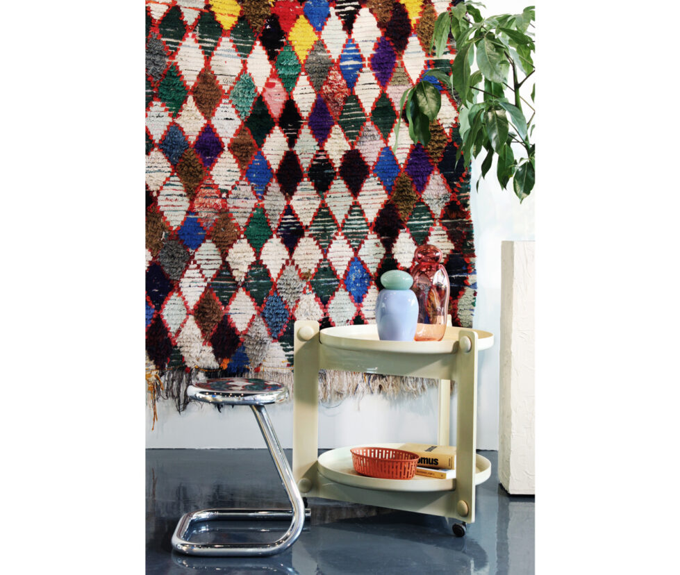 Seating with small side table and textile wall art