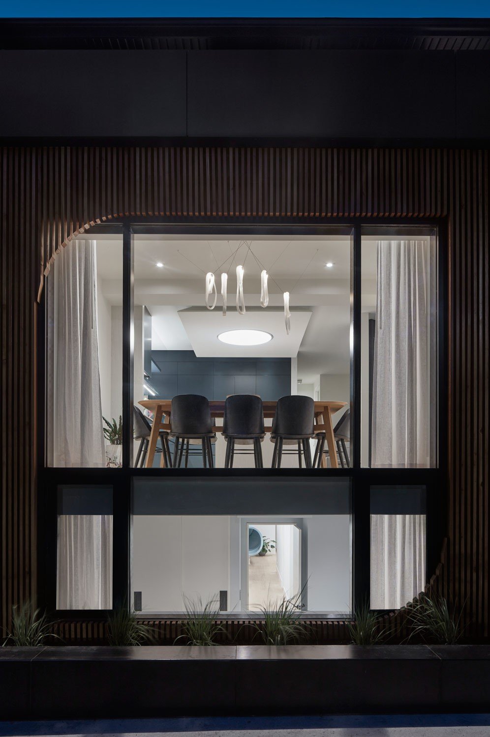 Reflect Architecture renovation add a blue slide to the Walker house
