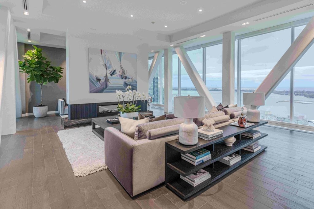 Condo interiors with a view of Lake Ontario in background