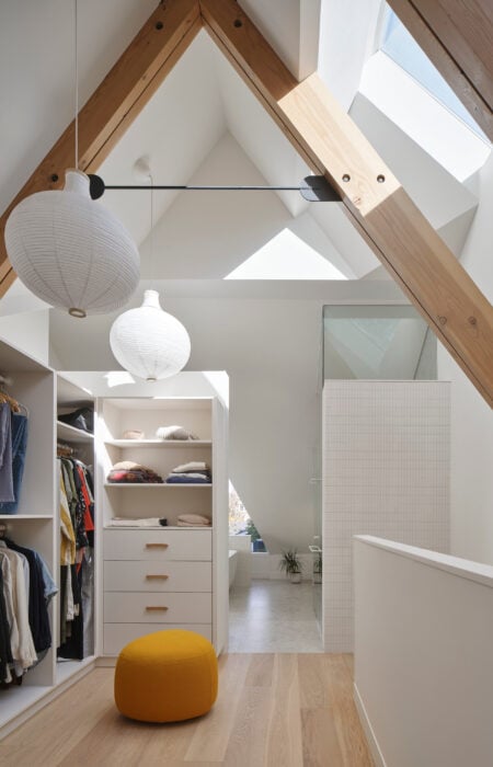 Contemporary A-frame house renovation in Toronto, showcasing the visible structure of the A-frame addition.